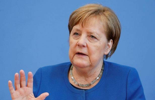 Меркель поддержала работу ВОЗ