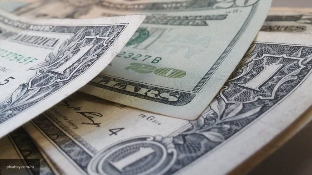 Эксперт CCIEE: доллар теряет влияние в мире из-за снижения уровня доверия к США