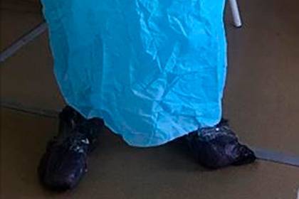 Власти оправдались из-за мусорных мешков на ногах российской медсестры