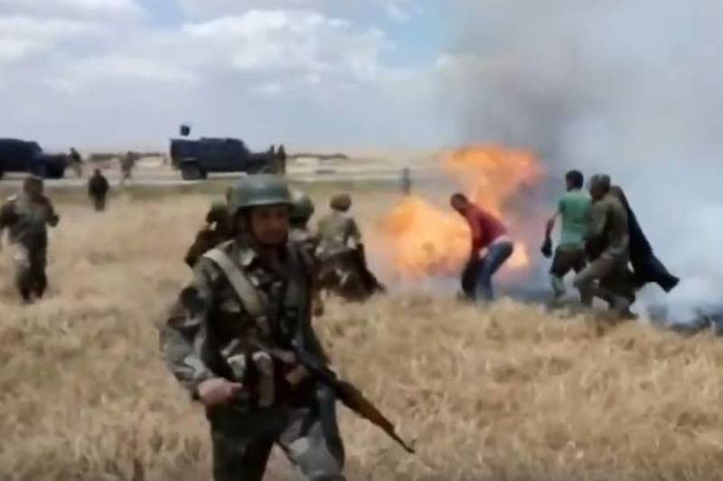 Американские военные целенаправленно поджигают урожай сирийцев