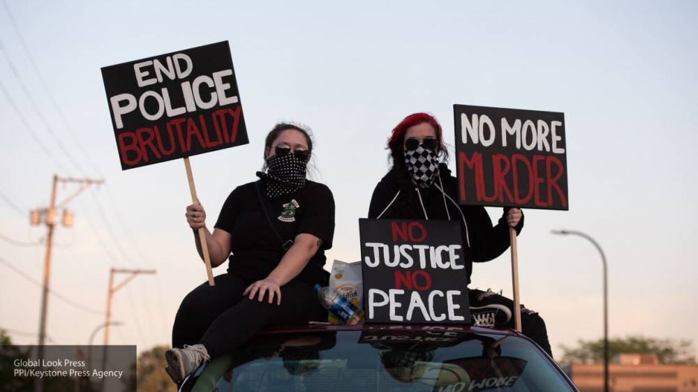 Десятки городов США охвачены протестами в солидарность с Миннеаполисом