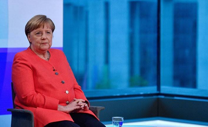 Меркель: нужно продолжать диалог с Россией (The Guardian)