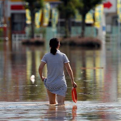 Число погибших из-за наводнений и оползней в Японии увеличилось до 24