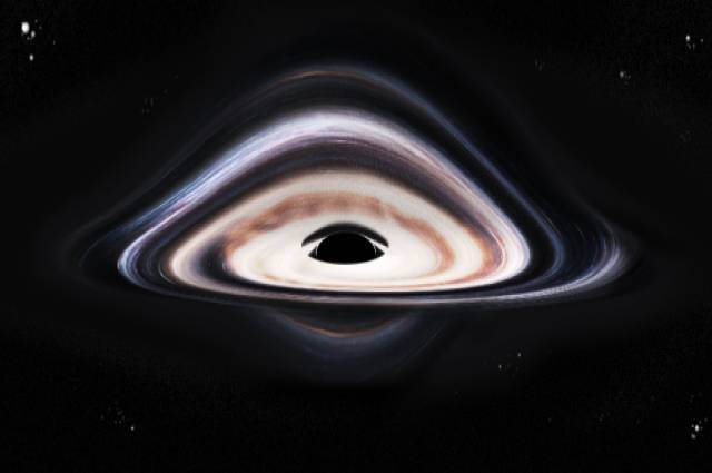 Ученые обнаружили мерцающую тень сверхмассивной черной дыры