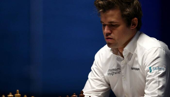 Карлсен и Непомнящий сыграли вничью первую партию матча за звание чемпиона мира по шахматам