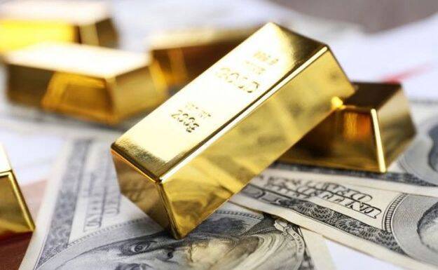 Золото дорожает на ослаблении доллара