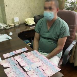В Киеве задержали врачей, которые требовали деньги при выдаче тела умершей от коронавируса. Фото