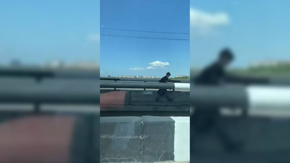 Воронежцы сняли на видео опасную прогулку ребёнка по краю моста над водохранилищем