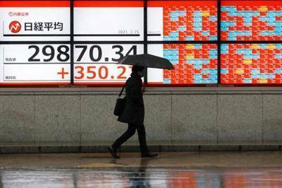 Японские акции закрылись ростом на фоне подъема Уолл-стрит и стабильных ставок в США