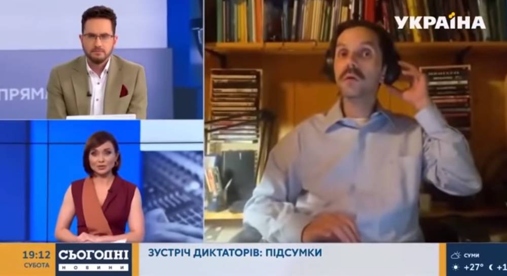 На украинском телеканале во время включения собеседника из РФ в кадре появилась голая женщина: видео