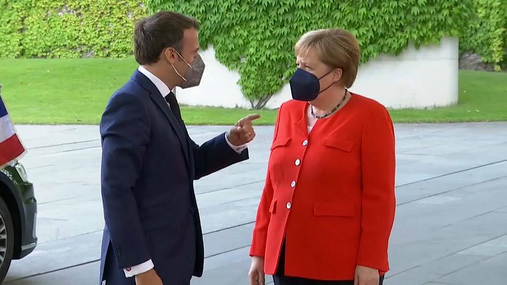 Меркель и Макрон призвали страны объединиться в борьбе против COVID-19