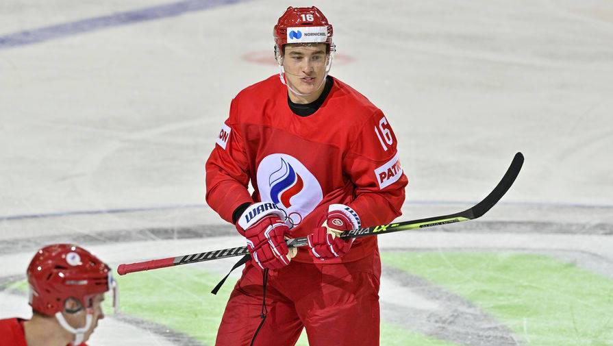 Хоккеист Задоров с улыбкой на лице общался с канадским игроком после поражения на ЧМ