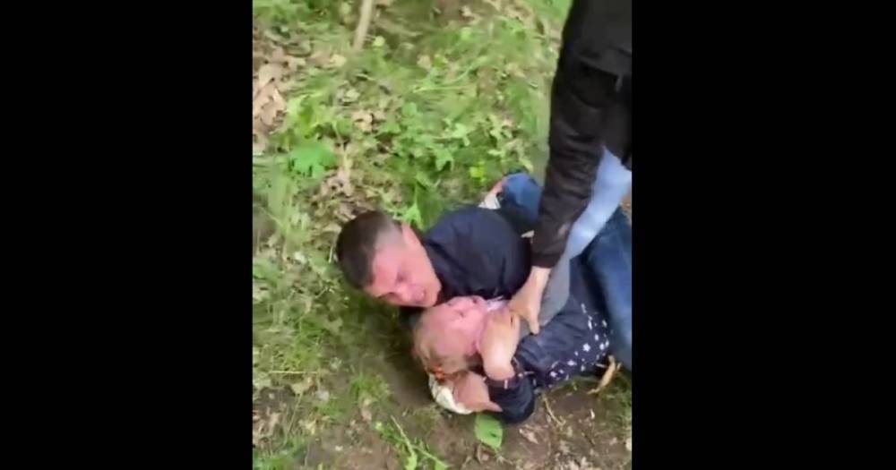В Харькове родители чуть не задушили девочку во время драки (видео)