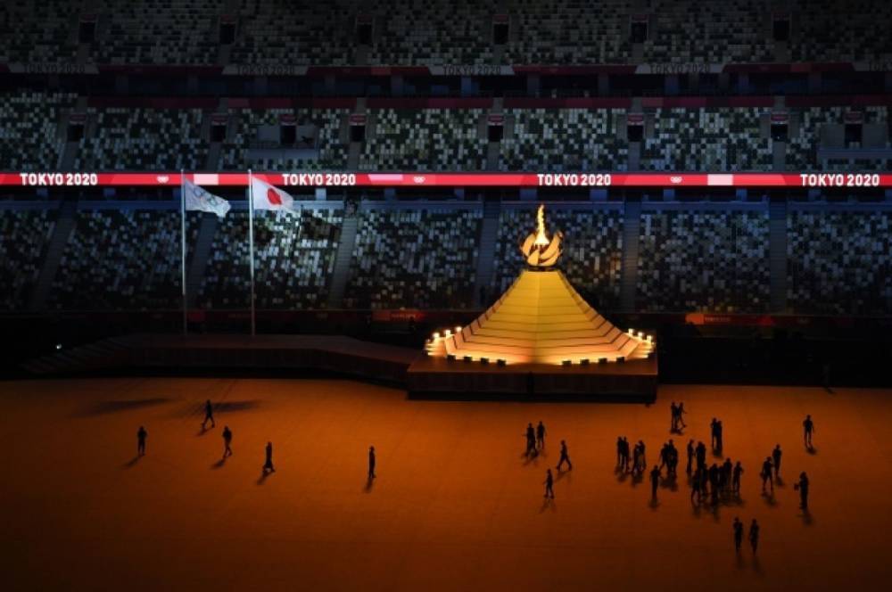 Огонь Олимпийских игр зажгли на церемонии открытия в Токио