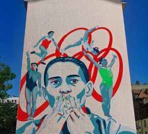 Галерея славы на заборе: олимпийцев увековечат на многоэтажках в Ташкенте
