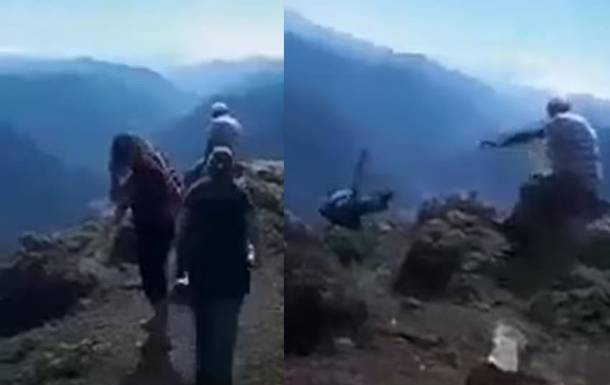 Падение туристки со скалы попало на видео. 18+