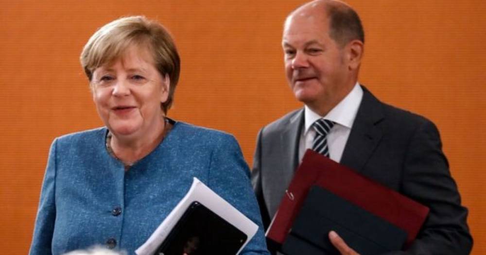 Меркель лично поздравила лидера социал-демократов Шольца с победой на выборах