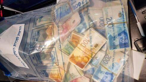 Полиция: в Иерусалиме "отмыли" 20 млн шекелей через пункт обмена валюты