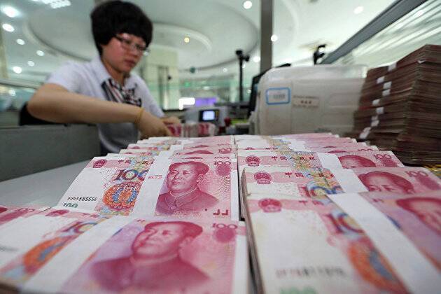 Центробанк Китая: число транзакций и объем трансграничных платежей в юанях выросли в 2021 году