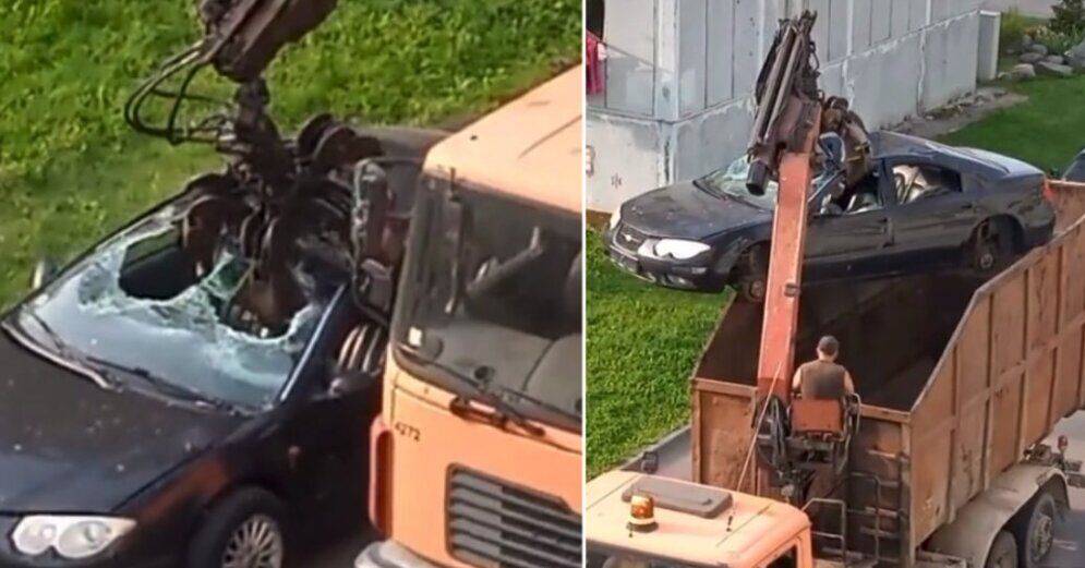 ВИДЕО: В Даугавпилсе автомобиль эвакуируют со двора дома прямиком на шрот