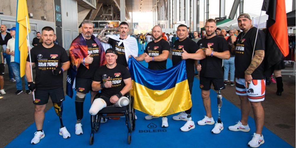 Протянули четыре грузовика. Украинские ветераны установили мировой рекорд по стронгмену на фестивале Шварценеггера