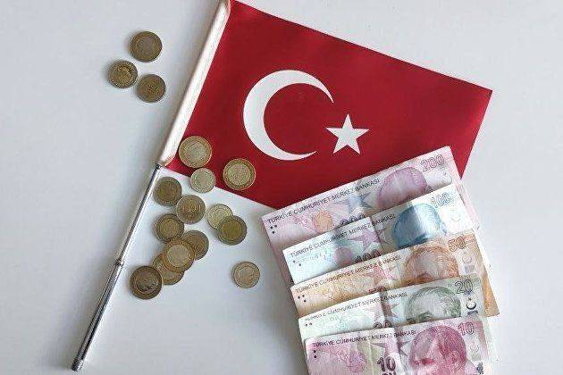 Турецкая лира дешевеет после достижения исторического минимума в 21 лиру за доллар в среду