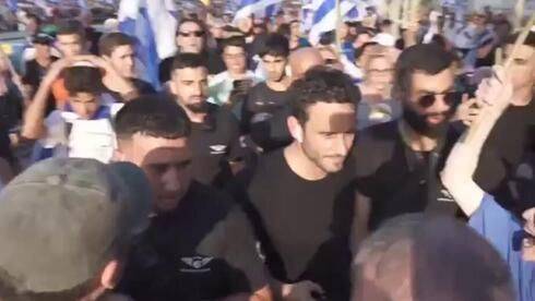 Два журналиста подверглись нападению участников акции в поддержку реформы в Тель-Авиве