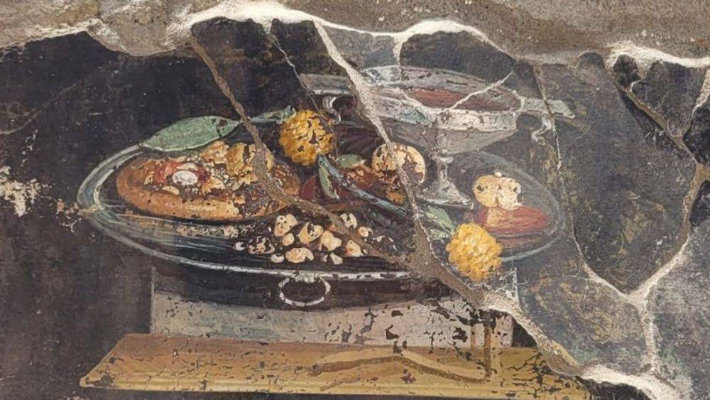 В Помпеях обнаружили фреску с пиццей, которой 2000 лет - фото