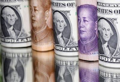 Доллар малоподвижен, юань в минусе после мер ЦБ