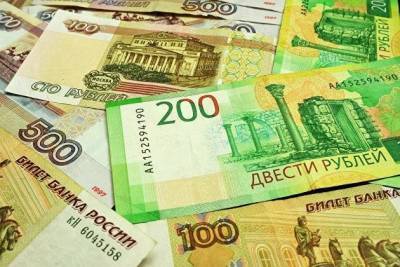 Рубль падает к доллару и евро на фоне общего негатива на биржах