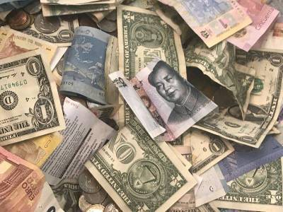 Азиатские и сырьевые валюты укрепляются после сильных данных из Китая