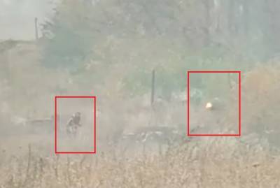 Военные засняли, как сепаратисты поджигали траву на Луганщине
