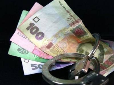 В Киевской области следователь полиции задержан при получении взятки 4 тысячи долларов