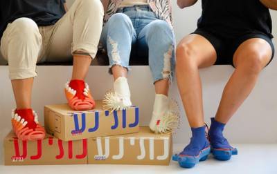 Показана обувь с насадками для тампонов и спичек - korrespondent.net - Израиль