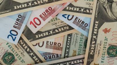 ЦБ снизил официальные курсы доллара и евро на 11 ноября