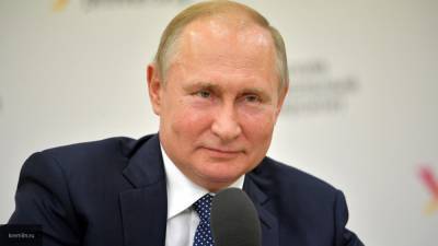 Путин отметил профессионализм коллектива "Российской газеты"