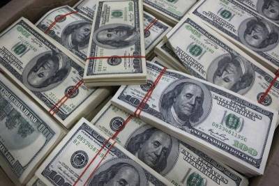 Средний курс доллара США со сроком расчетов "завтра" по итогам торгов на 19:00 мск составил 77,432 руб.