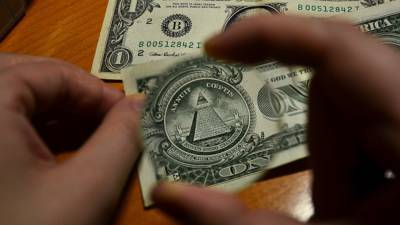Банк России снижает курсы доллара и евро на 17 ноября