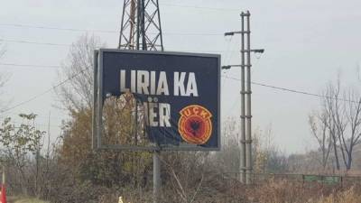 Возле сербского анклава подожжен баннер в поддержку косовских...