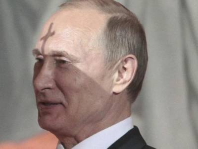 Госдума РФ одобрила в первом чтении законопроект о пожизненных гарантии Путину