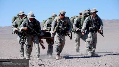 Коротченко назвал причину сокращения войск США в Афганистане и Ираке