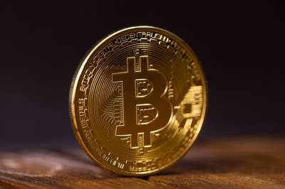 Стоимость Bitcoin превысила 18 тысяч долларов