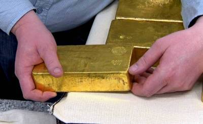 Дефолт по мировому госдолгу приведет к изъятию золота у населения