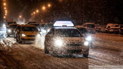 Москву накрыл снег с дождем