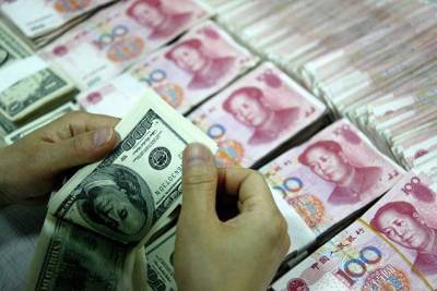 ЦБ Китая укрепил курс юаня к доллару до максимума с июня 2018 г
