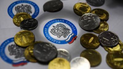 Путин подписал закон о повышении НДФЛ на доходы более 5 млн рублей