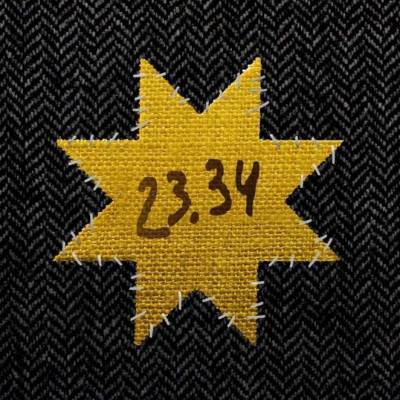 Желтая звезда с надписью 23.34. Новая работа Цеслера
