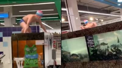 В херсонском "Сильпо" человек нырнул в аквариум с рыбой: его разыскивает полиция – видео