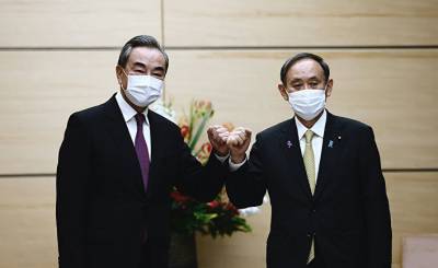 Ёсихидэ Суга встретился с Ваном И: новый кабинет министров Японии придает большое значение японо-китайским отношениям (The Paper, Китай)