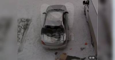 В России пьяница упал с 6 этажа на автомобиль и выжил: момент падения попал на видео
